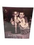Group of Signed Hockey Color Photos and Hockey Pucks Including (2) Gordie Howe