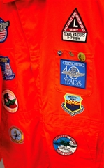Orange Jump Suit with Military Patches